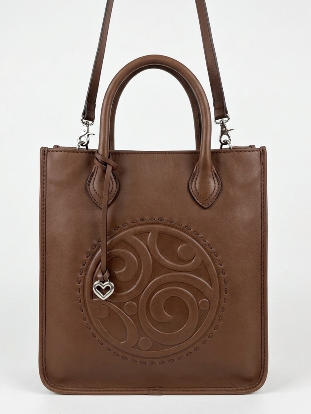Classic Brown Leather Tote Handbag with Embossed Medallion